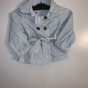 Navy blue trench style Jean jacket.